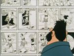 Brutus devant des planches de BD